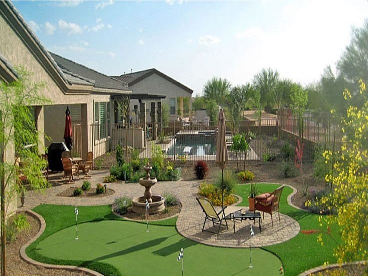 a uniquely designed landscape in Indio CA featuring artificial grass from Coachella Valley Turf