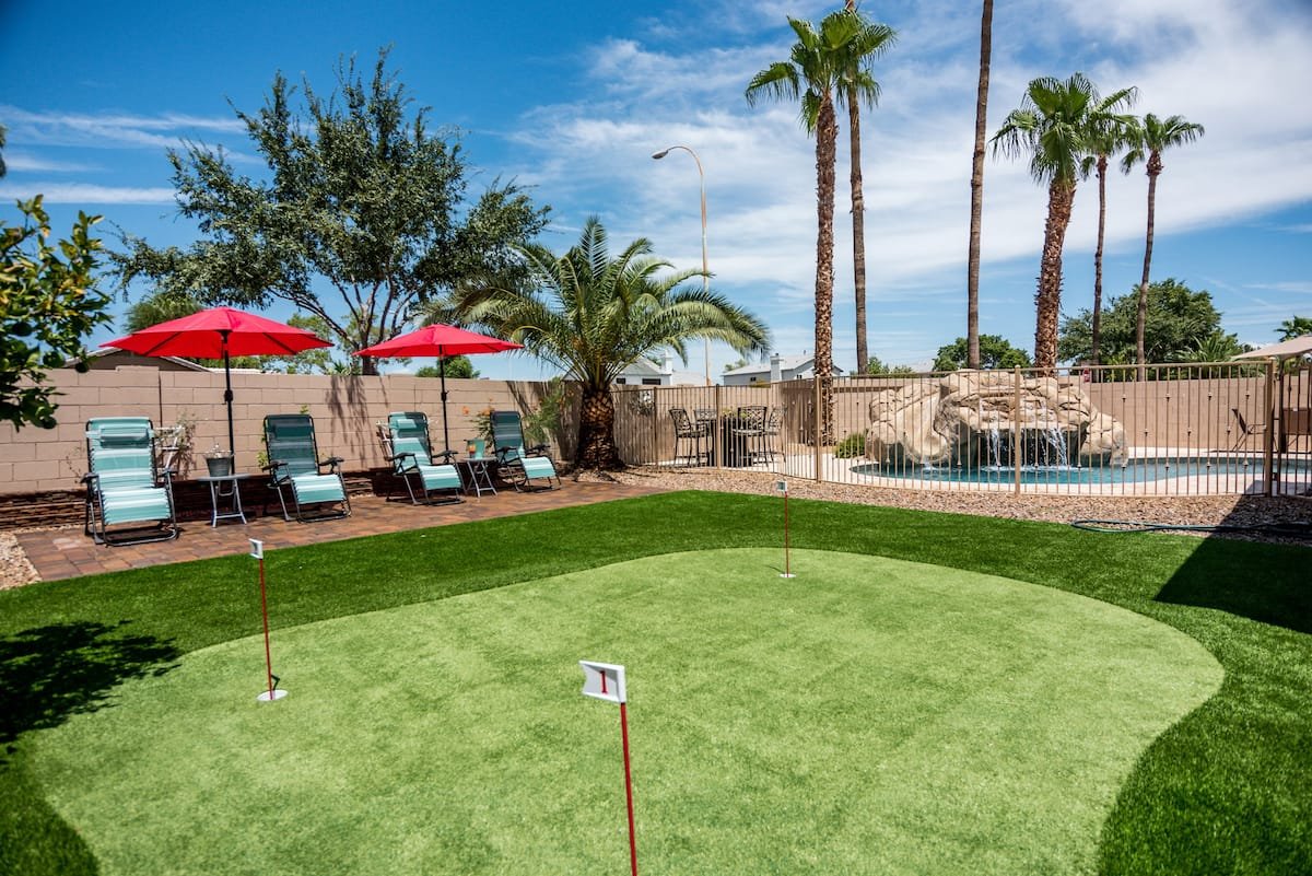 home putting green installed in a backyard in Indio CA for short game practices and relaxation purposes